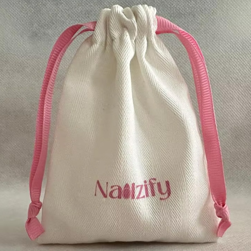 Luxury Herringbone Canvas Draw - огляд і ціна Luxury Bags Logo